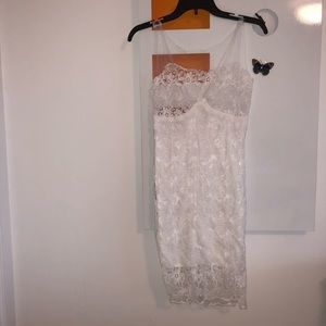White lace dress. See through